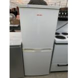 A WHITE BUSH UPRIGHT FRIDGE FREEZER