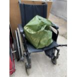 A BREEZY WHEEL CHAIR WITH MOTOR TO CONVERT TO ELECTRIC