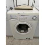 A WHITE BENDIX WASHING MACHINE