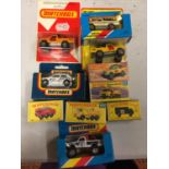 A COLLECTION OF BOXED AND UNBOXED MATCHBOX VEHICLES - ALL MODEL NUMBER 63 OF VARIOUS ERAS AND