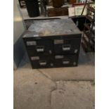 A SMALL FOUR DRAWER FILING CHEST