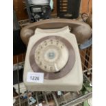 A RETRO GREY AND BROWN ROTARY DIAL TELEPHONE