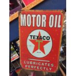 A TEXACO MOTOR OIL SIGN