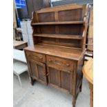 A MID 20TH CENTURY OAK DRESSER WITH PLATE RACK, 41" WIDE