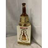 A BOXED BELL'S OLD SCOTCH WHISKY 'THE CELEBRATION SCOTCH' 70% PROOF, 37.8CL, IN A WADE COLLECTORS