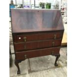 A MAHOGANY BUREAU, 30" WIDE