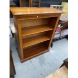 AN OPEN YEW WOOD THREE TIER BOOKCASE, 38" WIDE