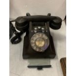 A VINTAGE BLACK 1950'S GPO 164 49 BAKELITE ROTARY DIAL TELEPHONE WITH ON/OFF BELL BUTTONS AND A PULL