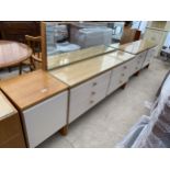 A 1970'S DRESSING CHEST, 56" WIDE AND TWO CHEST OF DRAWERS AND A LINEN CHEST