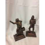 A PAIR OF BRONZE DIPPED FRENCH GRAPE PICKER METAL FIGURINES