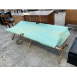 A VINTAGE, POSSIBLY MILITARY FOLDING CAMP BED