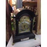 A VICTORIAN EBONISED BRACKET CLOCK WITH SILVERISED DIAL, GILDED DECORATION AND PIERCED SIDE