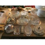 A QUANTITY OF GLASSWARE TO INCLUDE BOWLS, JUGS, TOAST RACK, LIDDED JARS ON STAINLESS STEEL STANDS,