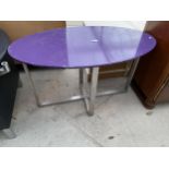 A MODERN OVAL OCCASIONAL TABLE ON STEEL FRAME