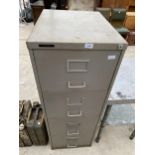 A METAL FOUR DRAWER FILING CABINET
