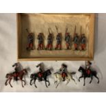A BOX CONTAINING ELEVEN UNBOXED BRITAINS FRENCH SOLDIERS - FOUR MOUNTED CUIRASSIERS AND