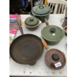 AN ASSORTMENT OF COOKING PANS TO INCLUDE A BROWN LE CREUSET MILK PAN, A GREEN LE CREUSET SAUCEPAN