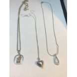 THREE MARKED SILVER NECKLACES WITH PENDANTS