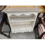A VICTORIAN STYLE WALL SHELF ENCLOSING THREE DRAWERS AND SIX HOOKS, 28" WIDE
