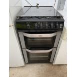 A BLACK BELLING FREESTANDING GAS COOKER AND HOB