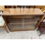 A RETRO TEAK BOOKCASE WITH GLASS SLIDING DOORS, 37" WIDE