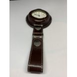 A REGENT POCKET WATCH IN A LEATHER CASE SEEN WORKING BUT NO WARRANTY