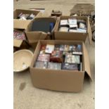 A LARGE ASSORTMENT OF CDS AND DVDS