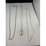 THREE SILVER GILT NECKLACES ONE WITH A BUTTERFLY AND CLEARSTONE PENDANT