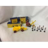 THREE BOXED MATCHBOX SERIES ITEMS - ROAD SIGNS, M10 DUMP TRUCK AND NO 4 EXCAVATOR (SOME ITEMS AND OR