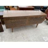 A RETRO CREAMY WALNUT AND CROSSBANDED BEAUTILITY SIDEBOARD, 63" WIDE