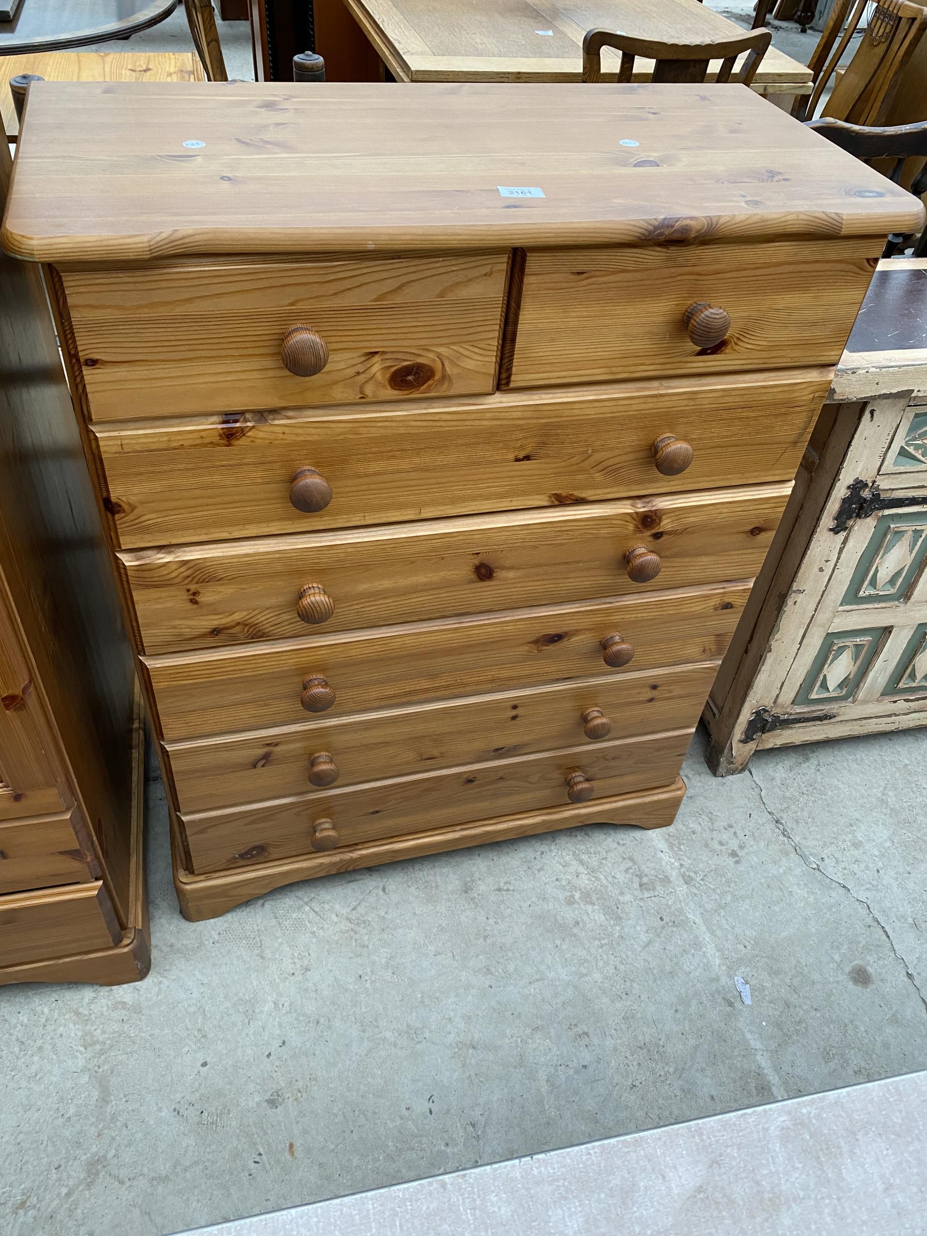 A MODERN PINE CHEST OF TWO SHORT AND FIVE LONG DRAWERS, 31.5" WIDE