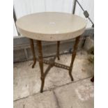 AN EMPIRE STYLE CENTRE TABLE ON GILT BASE WITH MARBLE EFFECT TOP, 23.5" DIAMETER