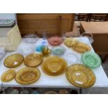 AN ASSORTMENT OF GLASS WARE TO INCLUDE COLOURED COMEMORTIVE DISHES ETC