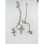 THREE MARKED SILVER NECKLACES WITH PENDANTS TO INCLUDE TWO WI TH CROSSES AND ONE WITH A CROSS,