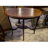 AN OVAL EDWARDIAN MAHOGANY AND INLAID TWO TIER CENTRE TABLE, 28 X 18"