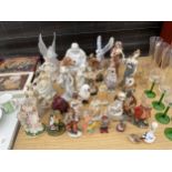 AN ASSORTMENT OF CERAMIC FIGURES TO INCLUDE ANIMALS, A BUDDHA AND FEMALE FIGURES ETC