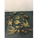 AN ASSORTMENT OF FIFTEEN SOLID BRASS ANIMALS TO INCLUDE ELEPHANTS, PHEASANTS AND FISH ETC