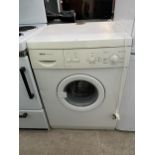 A WHITE BOSCH PRECISION WASHING MACHINE