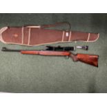 AN ORIGINAL MODEL 50 .22 AIR RIFLE WITH KASSNAR 9 X 40 TELESCOPIC SIGHTS AND FURTHER SIGHT