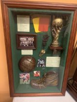 A FRAMED COLLECTION OF WORLD CUP MEMORBILLIA