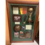 A FRAMED COLLECTION OF WORLD CUP MEMORBILLIA