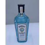 A 1 LITRE BOTTLE OF IMPORTED BOMBAY SAPPHIRE LONDON DRY GIN 47% VOL