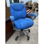 A MODERN SWIVEL OFFICE CHAIR IN BLUE