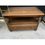 AN ERCOL ELM TV/VIDEO TABLE WITH SINGLE DRAWER AND TRIANGULAR BACK DROP-LEAF, 29" WIDE