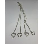 FOUR MARKED SILVER NECKLACES WITH HEART SHAPED PENDANTS