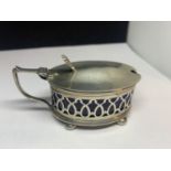 A HALLMARKED SHEEFIELD MUSTARD POT WITH BLUE GLASS LINER