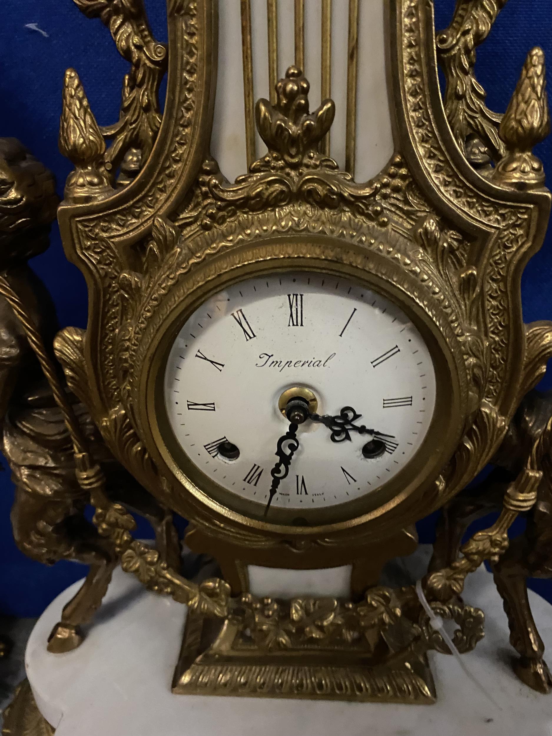 AN ORNATE IMPERIAL FRENCH GILT MANTLE CLOCK ON A MARBLE AND GILT BASE WITH CHERUB FAWN DECORATION - Image 3 of 10