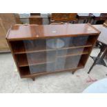 A RETRO TEAK BOOKCASE WITH TWO GLASS SLIDING DOORS, 43" WIDE