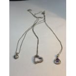 THREE MARKED SILVER NECKLACES WITH PENDANTS TO INCLUDE TWO HEARTS