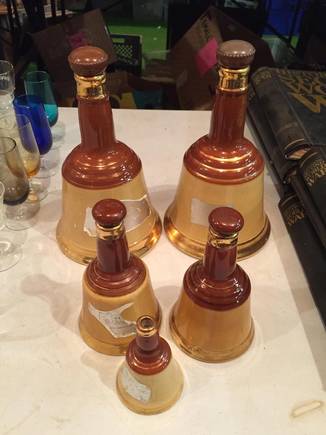 TWO LARGE, TWO MEDIUM AND ONE SMALL WADES WHISKY BELLS